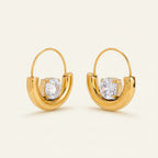 Seraphina Treasures Valeryth gold hoop earrings with round clear zircon centerpiece. Delicate and elegant.