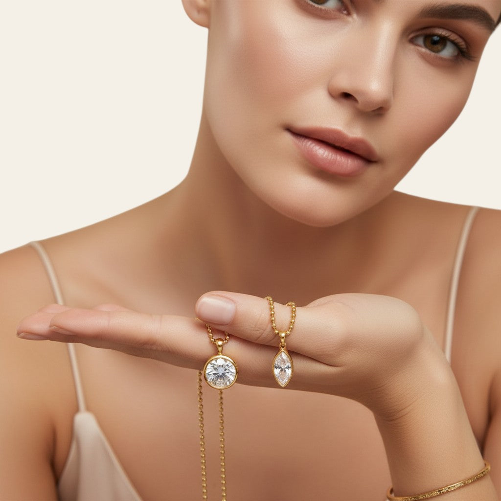Seraphina Treasures Orpheus gold necklaces with oval and horse eye zircon pendants. Timeless, elegant jewelry.