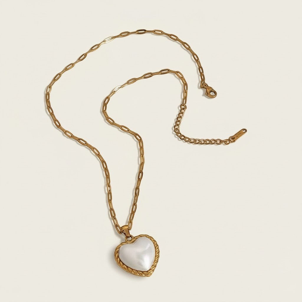 Seraphina Treasures Meryt necklace with gold chain and white heart-shaped imitation pearl pendant.