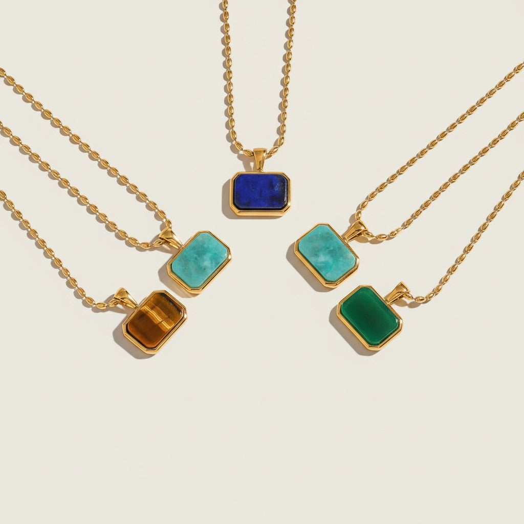 Seraphina Treasures Helena necklaces with amazonite, lapis lazuli, tiger eye, and jade stones on gold chains.