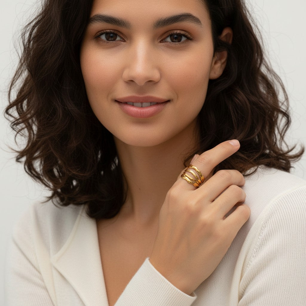 Seraphina Treasures Hexara gold layered ring with geometric shapes and subtle texture.