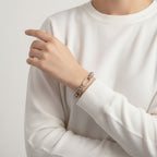 Seraphina Treasures Isolde silver-tone metal link bracelet with knot details and secure clasp.