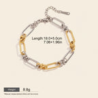 Seraphina Treasures Isolde two-tone link bracelet with cross clasp, silver and gold plated stainless steel.