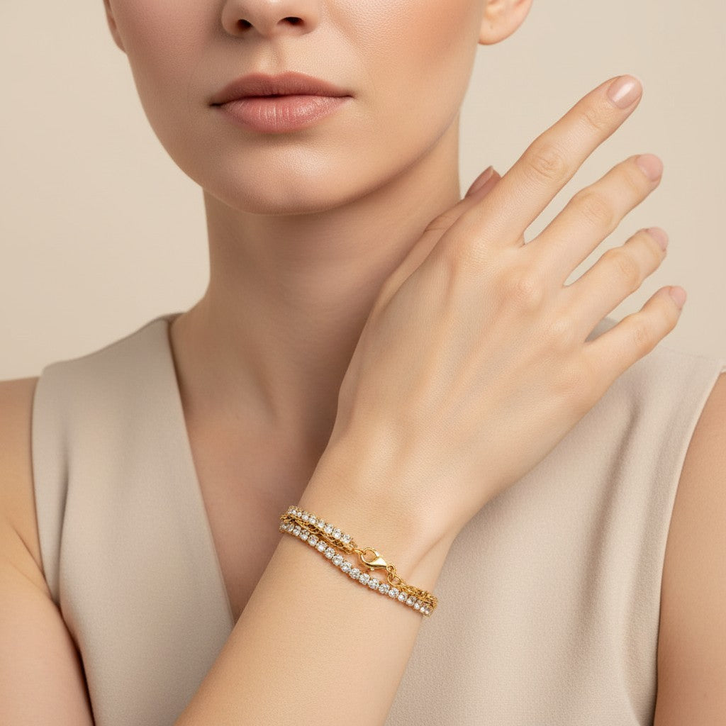 Seraphina Treasures Ithela gold-tone layered bracelet with clear crystals, delicate chain, and lobster clasp.