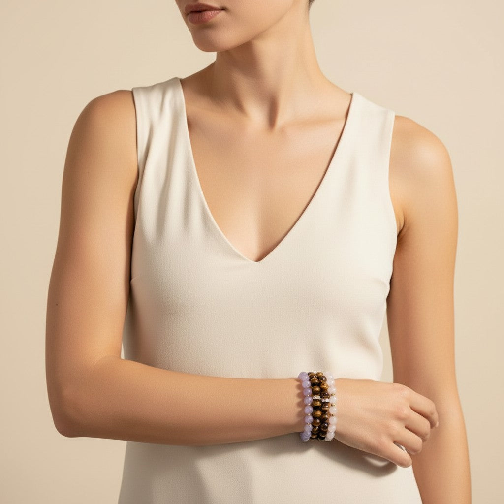 Seraphina Treasures Jocasta bracelet stack with tiger's eye, amethyst, and rose quartz beads, accented with small gold spacers.