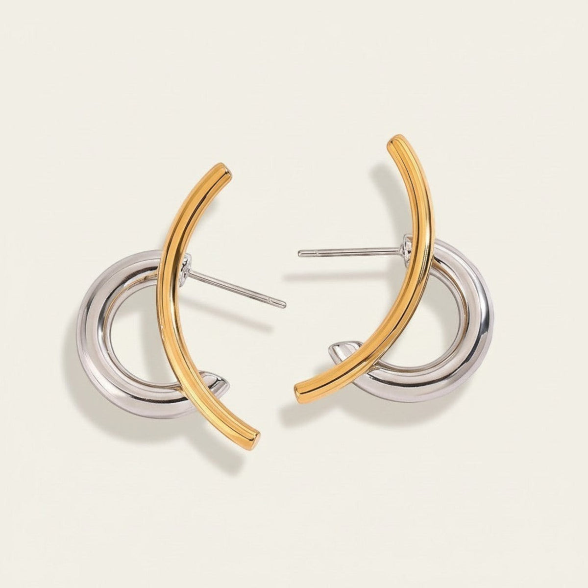 Seraphina Treasures Jovara two-tone gold and silver hoop earrings with a modern, sculptural design.