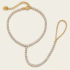 Seraphina Treasures Junia gold bracelet with white zirconia stones, connecting to a finger loop.