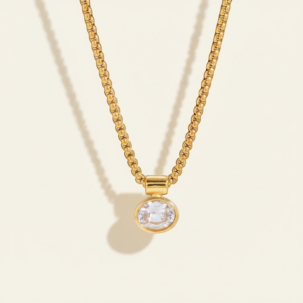 Seraphina Treasures Kallistra necklace with oval zircon pendant on a gold chain. Minimalist design, perfect for layering.