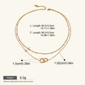 Seraphina Treasures Keeva gold-tone double chain necklace with interlocking rings pendant. Adjustable length.