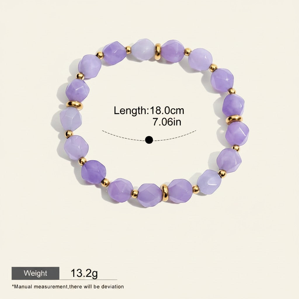 Seraphina Treasures Jocasta bracelet with faceted lavender jade beads and gold spacers. Waterproof and hypoallergenic.