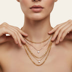 Seraphina Treasures Skotera three-layer necklace with gold and silver chains, each with a round zircon pendant.