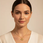 Seraphina Treasures Liora gold sun pendant necklace with beaded chain. Delicate and radiant design.