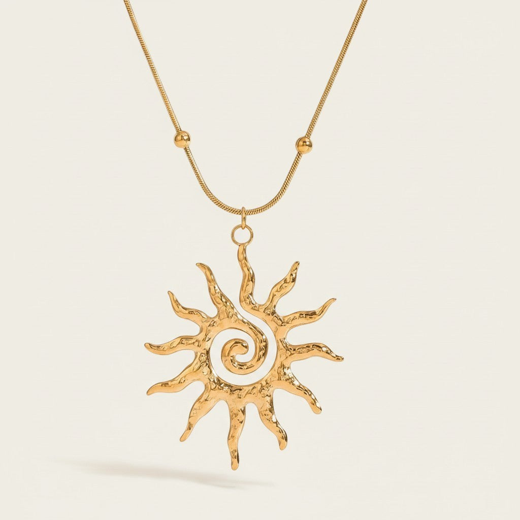 Seraphina Treasures Liora gold sun pendant necklace with textured finish and delicate chain.