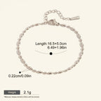 Seraphina Treasures Lumina silver-tone stainless steel bracelet with oval beads and adjustable chain.