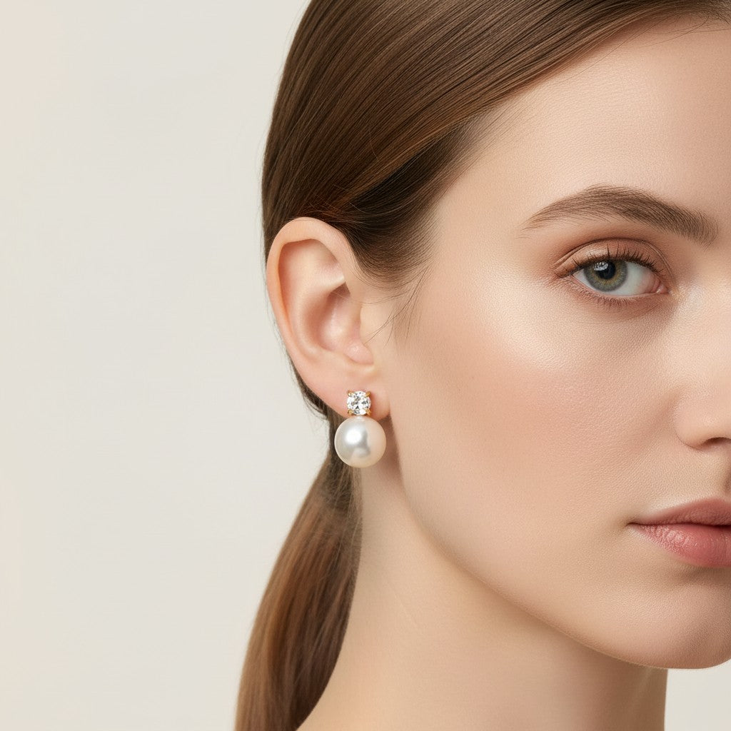 Seraphina Treasures Luminara pearl and diamond stud earrings in gold.
