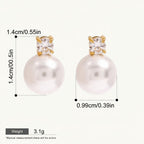 Seraphina Treasures Luminara pearl and diamond stud earrings. Classic gold-tone studs with lustrous white pearls.