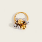 Seraphina Treasures Luxadore ring with gold and silver bead details, symbolizing unity and continuity.