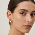 Seraphina Treasures gold-tone Majora earrings with bow and heart pendant. Delicate and charming.