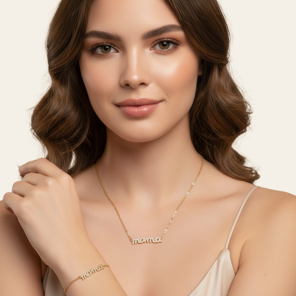 Seraphina Treasures gold finish necklace and bracelet set with crystal-embellished "MAMA" lettering.