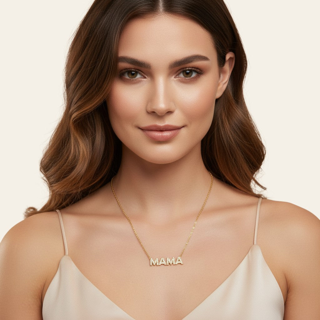 Seraphina Treasures gold plated necklace with "MAMA" spelled out in pave set crystals.