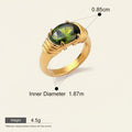 Seraphina Treasures Meliora gold ring with oval green gemstone, ribbed band, waterproof and hypoallergenic.