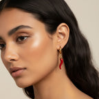 Seraphina Treasures Mirava gold hoop earrings with red chili pepper charms. Playful and bold design.