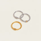 Seraphina Treasures Miravore hoop earrings in silver and gold, featuring stacked bead details.