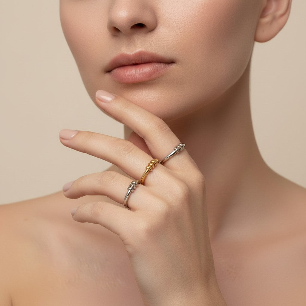 Seraphina Treasures Miravore rings in gold and silver, delicate knot detail, perfect for everyday wear.