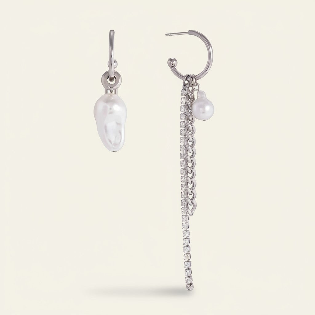 Seraphina Treasures Argenyx mismatched pearl drop earrings with silver chains and crystals. Asymmetrical design.