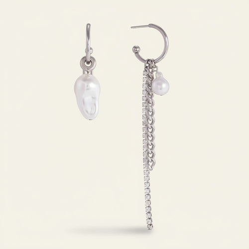 Seraphina Treasures Argenyx mismatched pearl drop earrings with silver chains and crystals. Asymmetrical design.