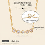 Seraphina Treasures gold-tone necklace with clear gemstones in mixed shapes: round, square, and rectangular. Features an extender chain.