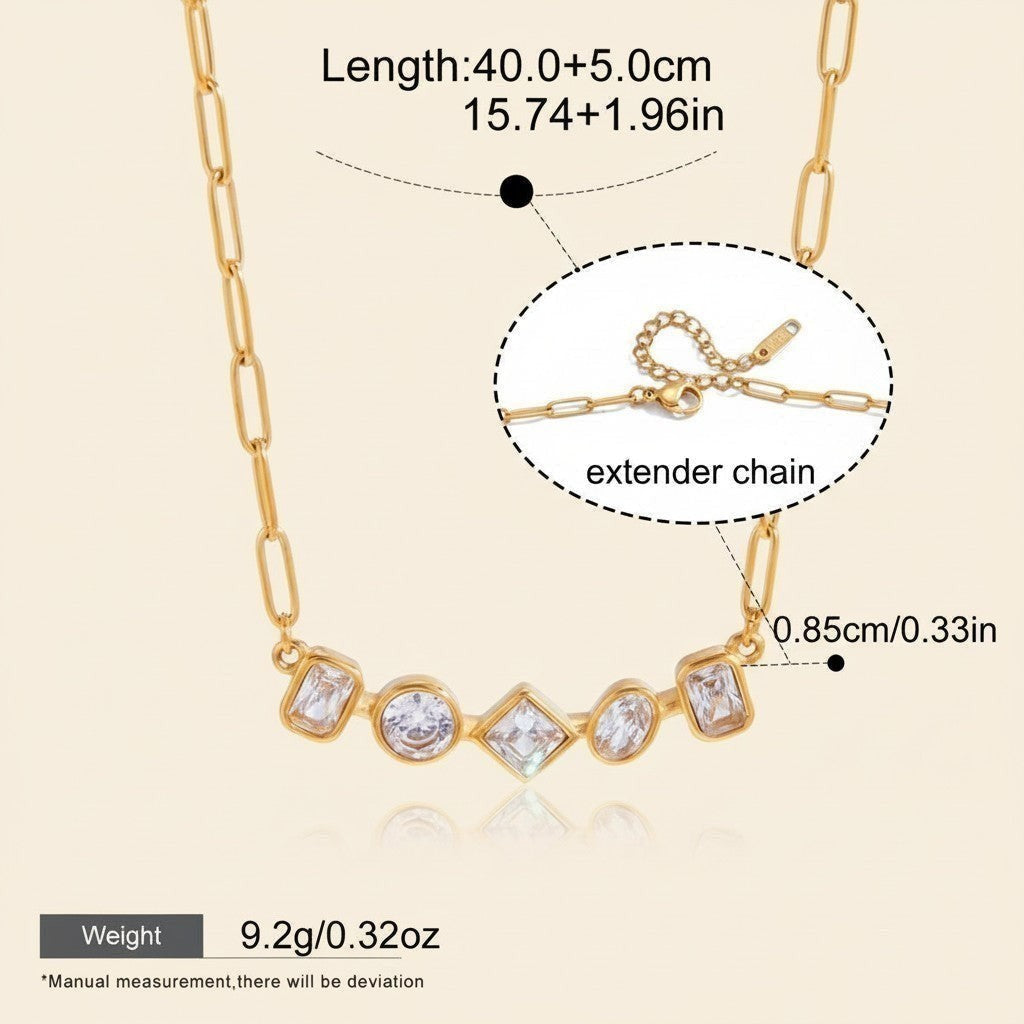 Seraphina Treasures gold-tone necklace with clear gemstones in mixed shapes: round, square, and rectangular. Features an extender chain.