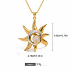 Seraphina Treasures Moirai gold and silver sun ring with moon accent and cream stone. Celestial-inspired.