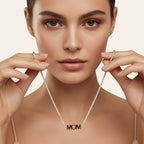 Seraphina Treasures gold necklace with crystal-lined chain and bold "MOM" pendant. Perfect for Mother's Day.