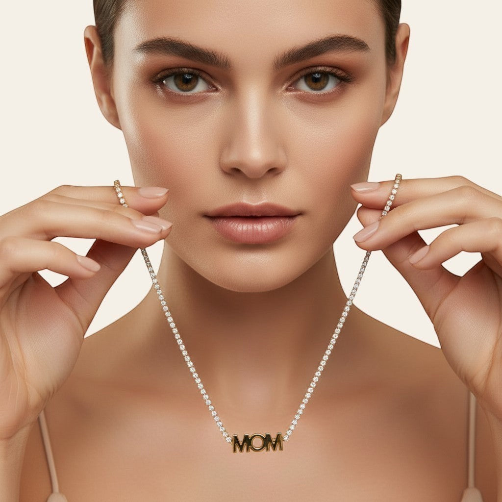 Seraphina Treasures gold necklace with crystal-lined chain and bold "MOM" pendant. Perfect for Mother's Day.