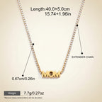 Seraphina Treasures gold-tone necklace with crystal-lined chain and "MOM" pendant. Features an extender chain.