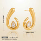 Seraphina Treasures Morviane gold spiral earrings with pear-shaped clear crystal accent. Hypoallergenic.
