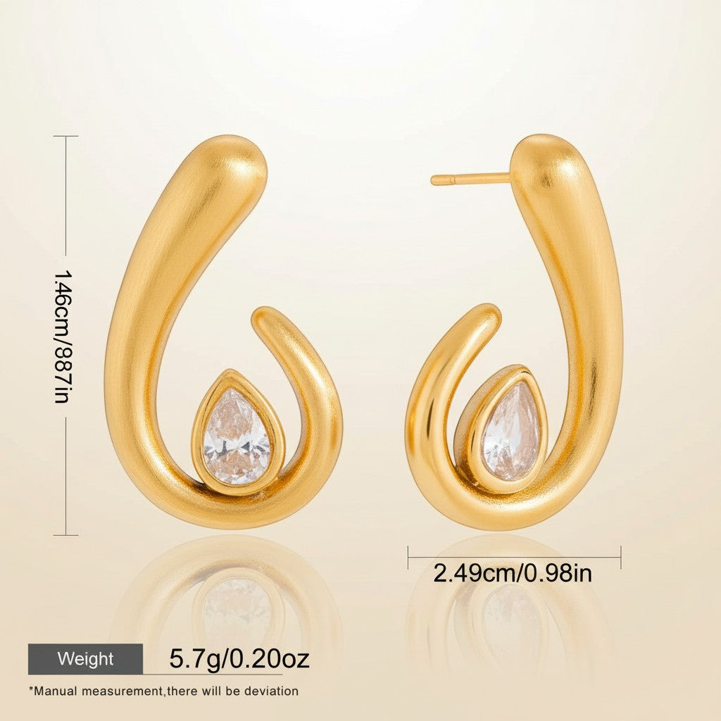 Seraphina Treasures Morviane gold spiral earrings with pear-shaped clear crystal accent. Hypoallergenic.