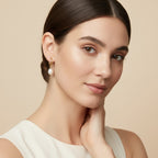Seraphina Treasures Myrrhina gold huggie earrings with freshwater pearl drop.