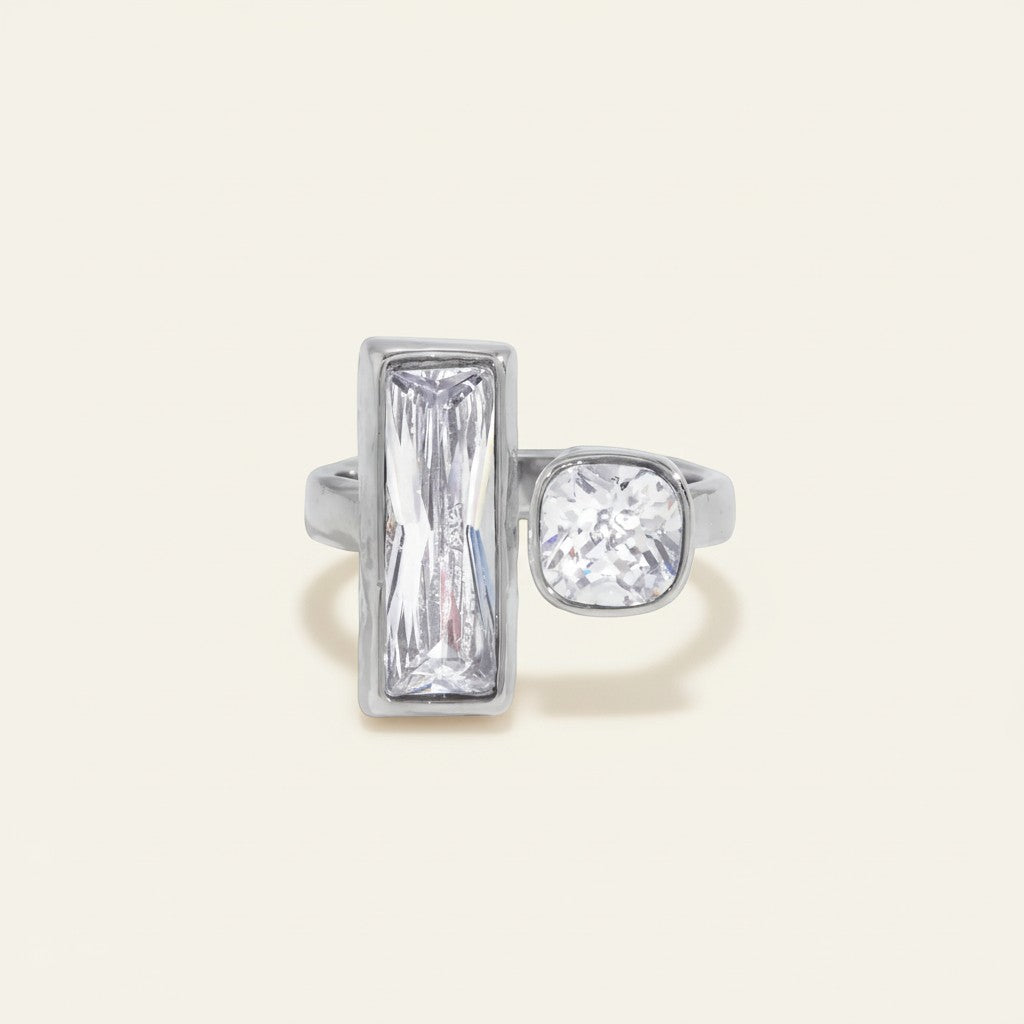 Seraphina Treasures Myrrhynne ring with silver band and two clear crystals: one baguette cut and one cushion cut.