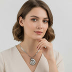 Seraphina Treasures Nymeris necklace with a silver ammonite pendant on a herringbone chain. Natural elegance.