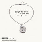 Seraphina Treasures Nymeris silver-tone ammonite shell pendant necklace with adjustable length.