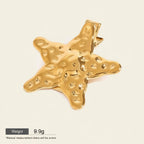 Seraphina Treasures Nyx gold hammered sea star hairpin. Elegant hair accessory with a unique textured finish.