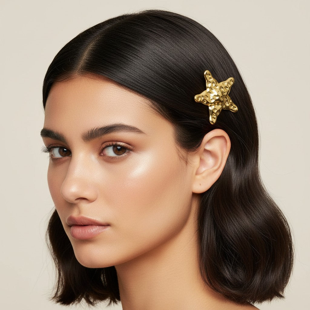 Seraphina Treasures Nyx gold hammered sea star hairpin. Textured metal hair accessory.