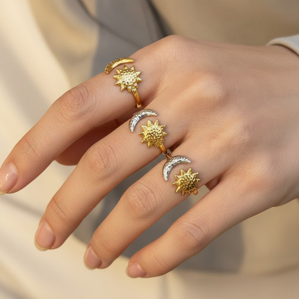 Seraphina Treasures Nyx adjustable open rings with sun and moon motifs in gold and silver tones.