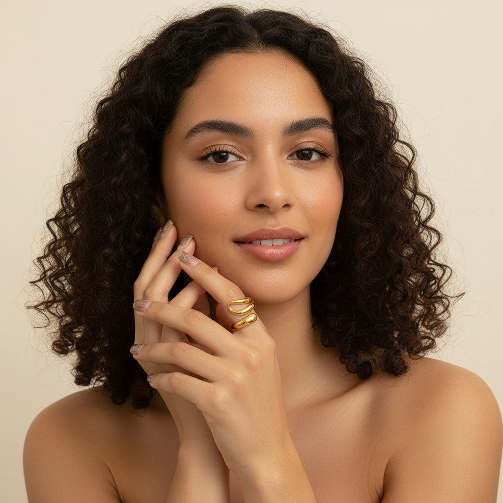 Seraphina Treasures Ondara gold ring with hollow, smooth, curved design. Minimalist jewelry.