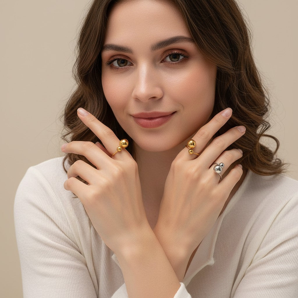 Seraphina Treasures Orbis ring with contrasting gold and silver balls in geometric design.