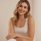 Seraphina Treasures Orichal ring in gold with a textured, open design. Model wears a white tank top.