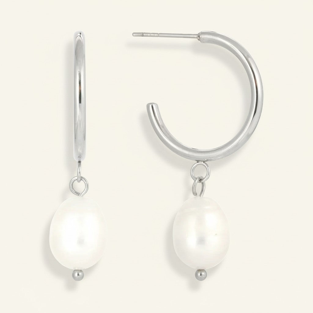 Seraphina Treasures silver hoop earrings with white freshwater pearl drops. Elegant, classic design.