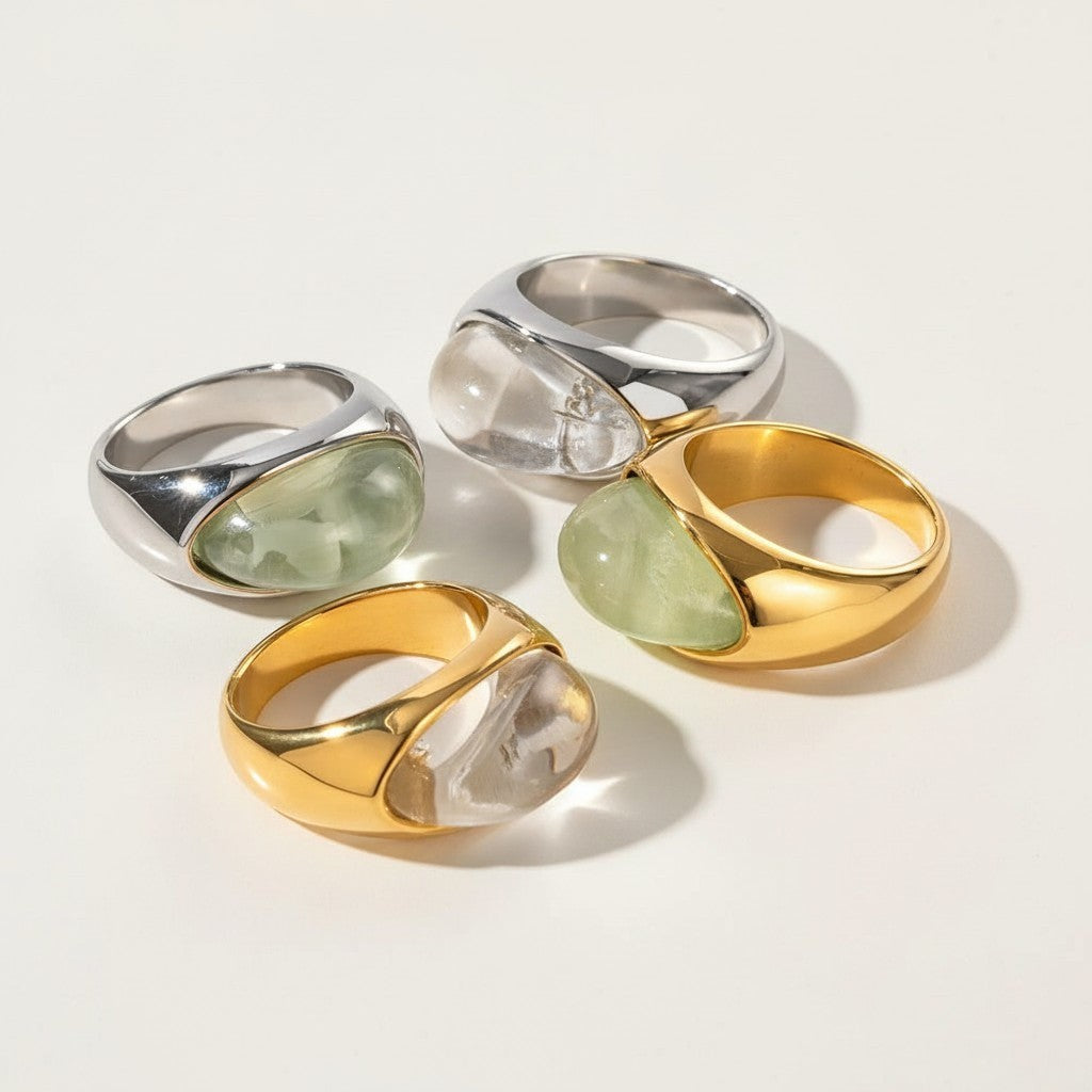 Seraphina Treasures Phoebe ring with clear or green stone, gold or silver band. Modern, sleek design.